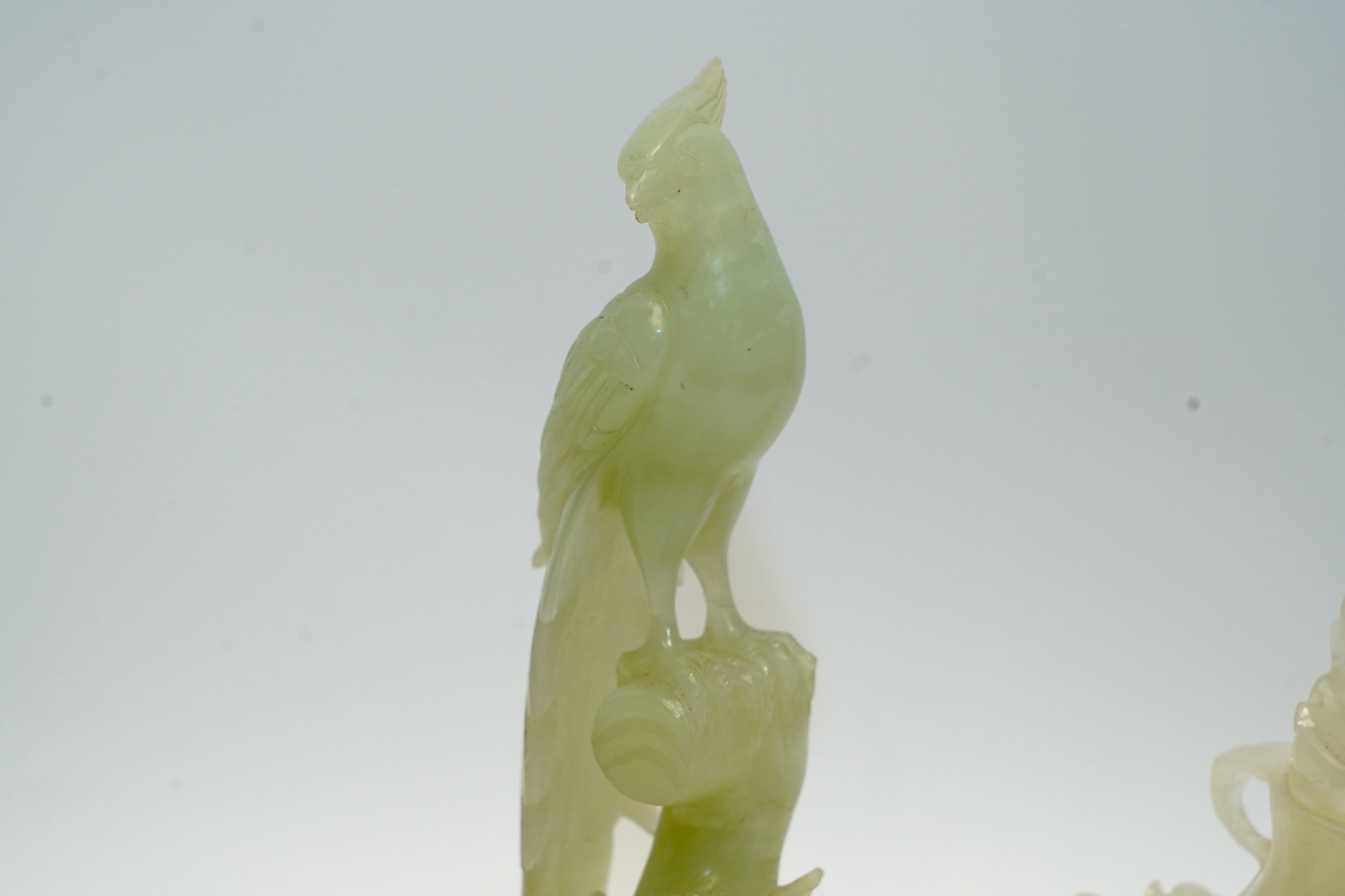 Four Chinese bowenite jade pieces including carving of a bird, largest 20cm. Condition - fair